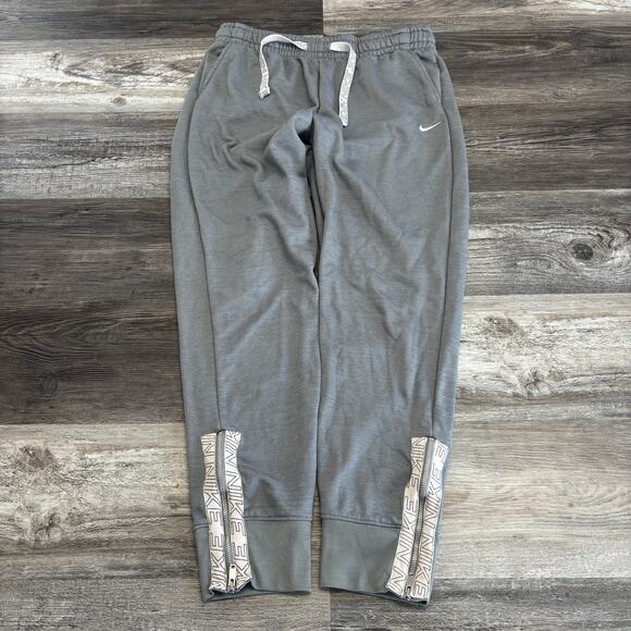Nike‎ Dri Fit Gray womens M Ankle Zip Fleece Swoosh Athletic Sweat Jogger Pants - Picture 1 of 11